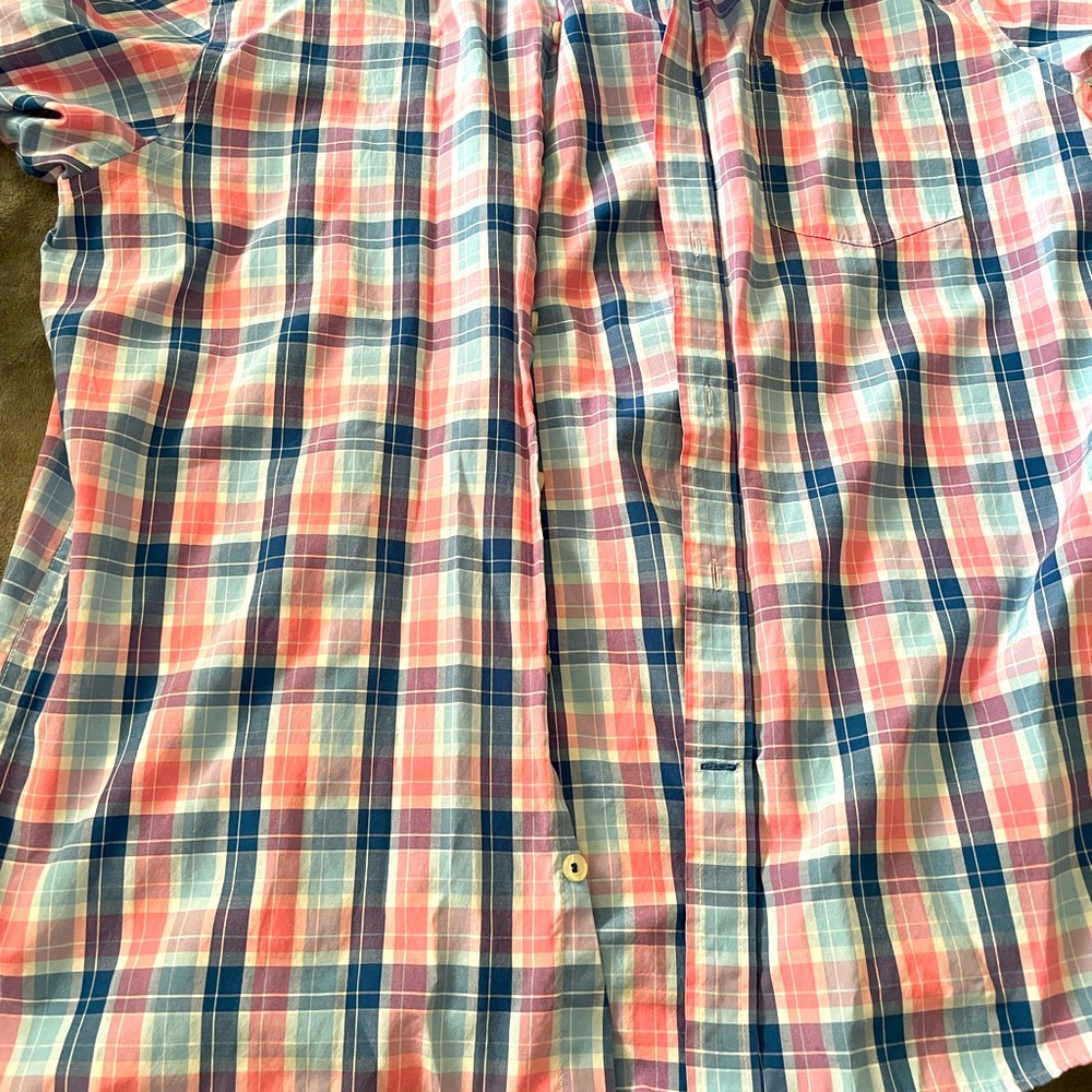 Good t shirt button down stripes never been wore